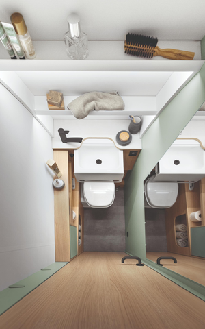 Platzsparende Badausstattung im LMC Wohnwagen Style 440 D (Waschbecken ausgezogen).